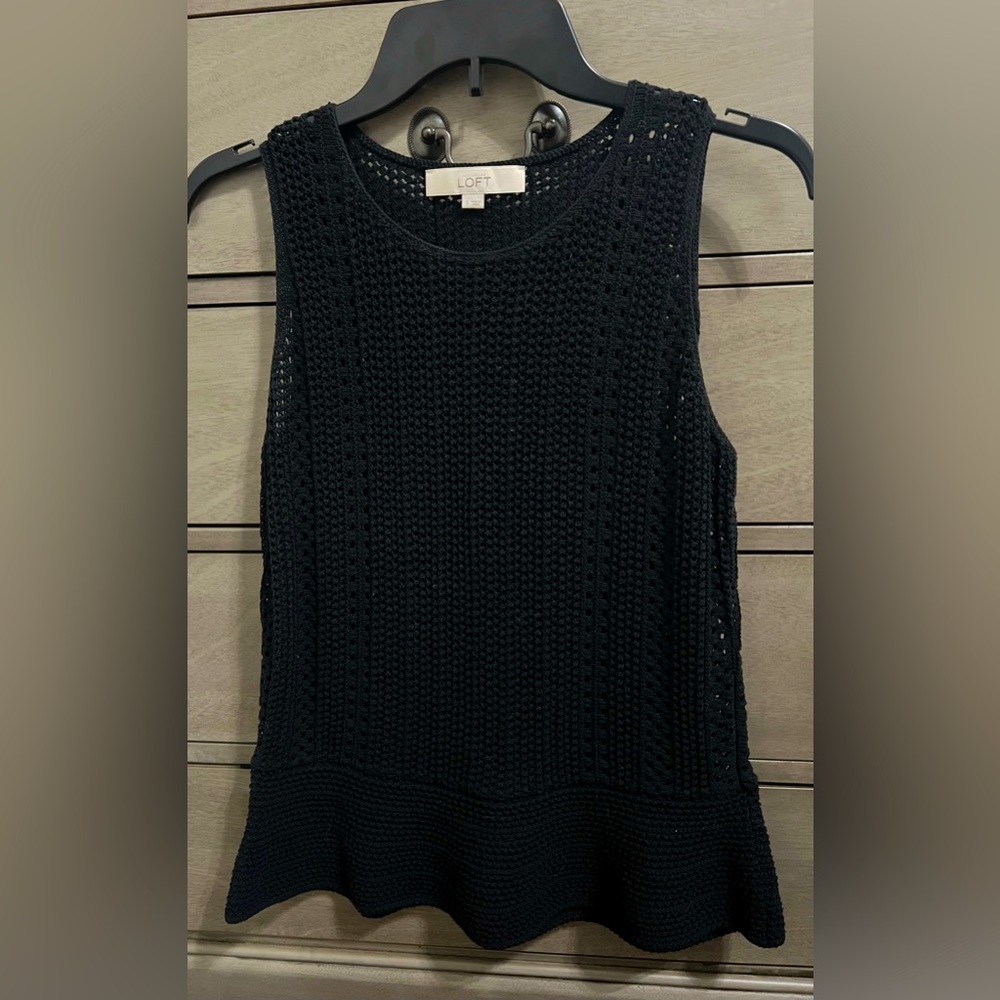 Peplum styled crocheted blouse